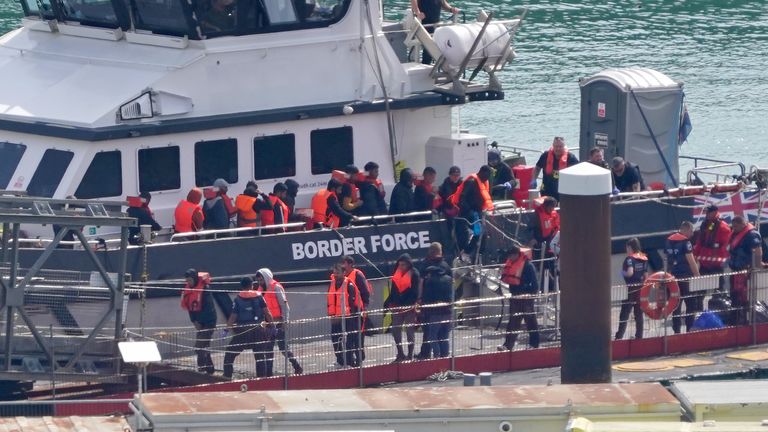 A group of people are brought in to Dover, Kent, from a Border Force vessel following a small boat incident in the Channel.
Pic: PA