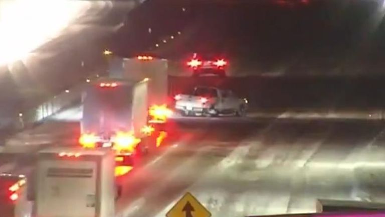 Lorries and cars swerve around broken-down truck in Minnesota