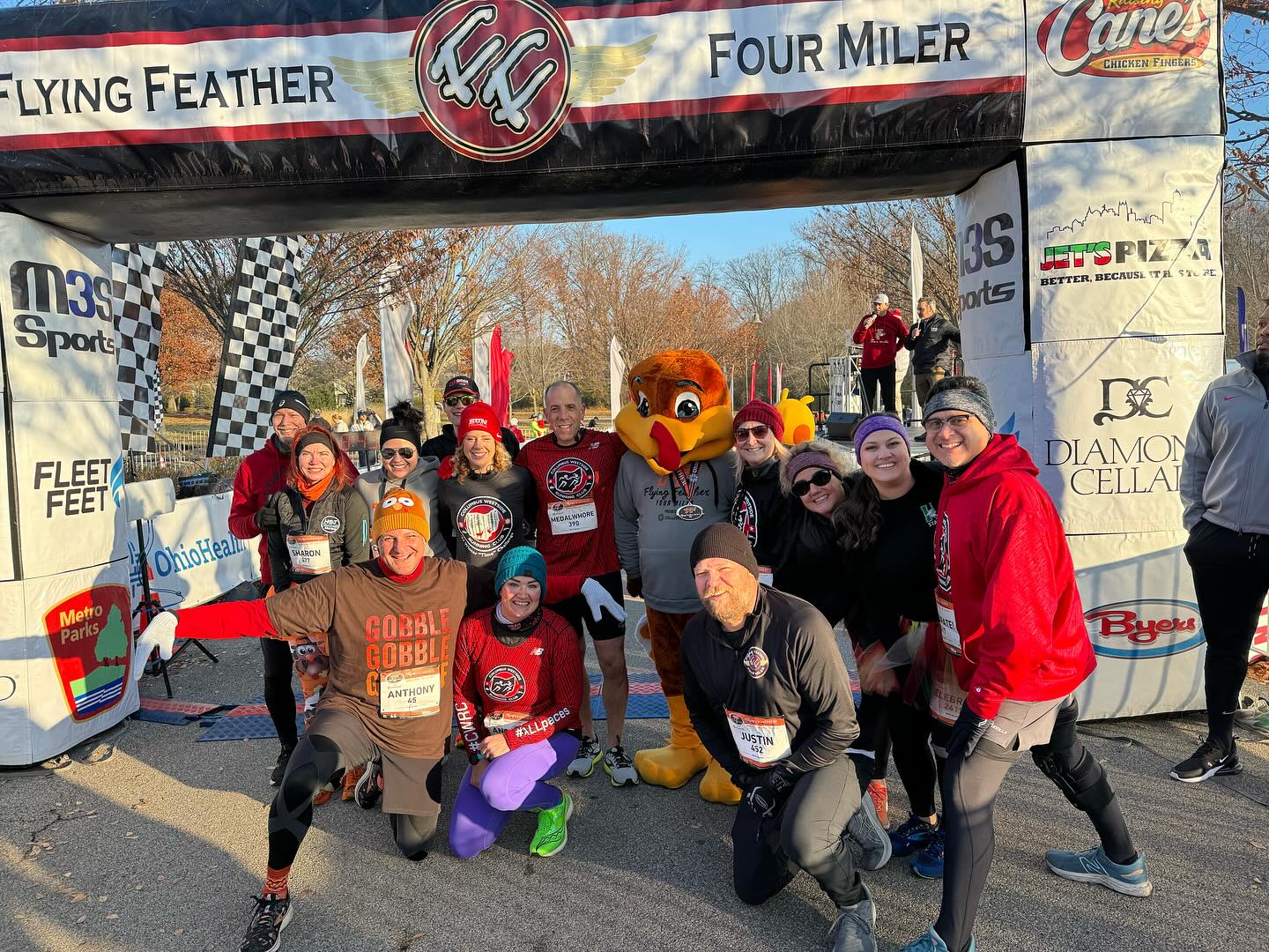 Runners at the start line of the Flying Feather in Columbus.