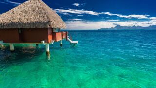 7 overwater bungalows for a budget-friendly tropical getaway