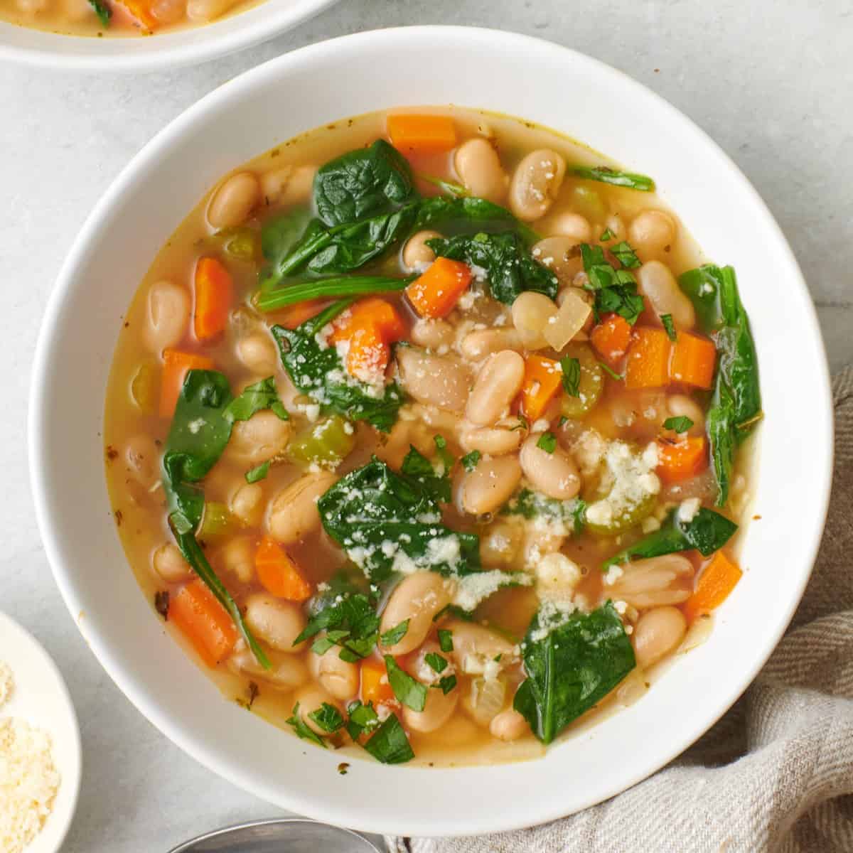 white bean soup in a bowl close up view