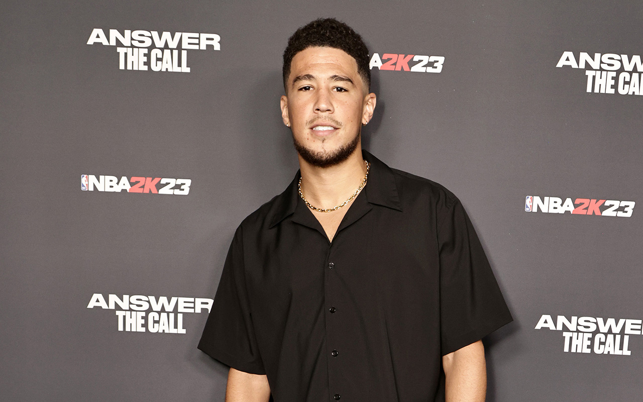 LOS ANGELES, CALIFORNIA - SEPTEMBER 07: Devin Booker attends the NBA 2K23 Launch Event at Rolling Greens on September 07, 2022 in Los Angeles, California. (Photo by Greg Doherty/Getty Images for 2K)