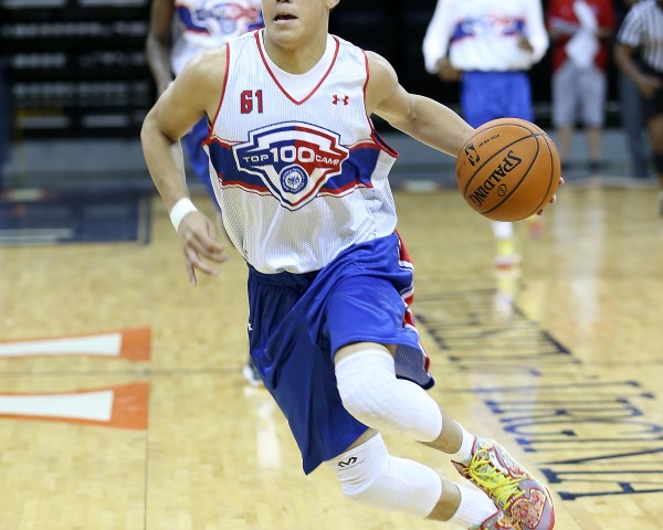 CHARLOTTESVILLE, VA - JUNE 15: Devin Booker #61 brings the ball up the court during the NBPA Top 100 Camp on June 15, 2013 at John Paul Jones Arena in Charlottesville, Virginia. (Photo by Kelly Kline/Getty Images)