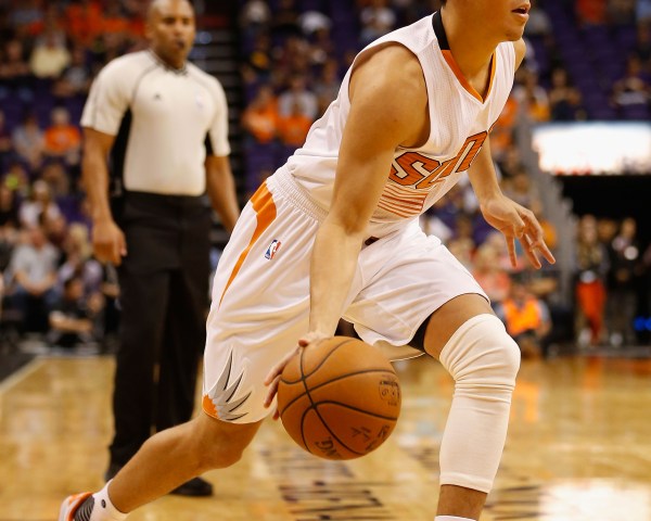 PHOENIX, AZ - OCTOBER 07:  Devin Booker #1 of the Phoenix Suns handles the ball during the preseason NBA game against the Sacramento Kings at Talking Stick Resort Arena on October 7, 2015 in Phoenix, Arizona. The Suns defeated the Kings 102-98. NOTE TO USER: User expressly acknowledges and agrees that, by downloading and or using this photograph, User is consenting to the terms and conditions of the Getty Images License Agreement.  (Photo by Christian Petersen/Getty Images)