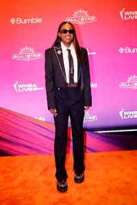 PHOENIX, ARIZONA - JULY 18: Jackie Young #0 of the Las Vegas Aces walks the orange carpet during the 2024 WNBA All-Star Weekend at Phoenix Convention Center on July 18, 2024 in Phoenix, Arizona. NOTE TO USER: User expressly acknowledges and agrees that, by downloading and or using this photograph, User is consenting to the terms and conditions of the Getty Images License Agreement. (Photo by Alex Slitz/Getty Images)