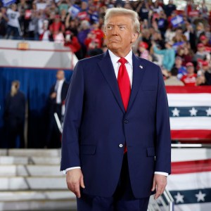 RALEIGH, NORTH CAROLINA - NOVEMBER 04: Republican presidential nominee, former U.S. President Donald Trump takes the stage during a campaign rally at the J.S. Dorton Arena on November 04, 2024 in Raleigh, North Carolina. With one day left before the general election, Trump is campaigning for re-election in the battleground states of North Carolina, Pennsylvania and Michigan. (Photo by Chip Somodevilla/Getty Images)