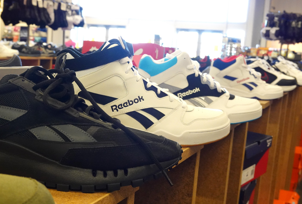 NOVATO, CALIFORNIA - MARCH 17: Reebok shoes are displayed at a Designer Shoe Warehouse store on March 17, 2022 in Novato, California. As many American companies have halted business in Russia due to the Russian invasion of Ukraine, some companies are opting to continue their business in the country. Well known brands like Reebok, Eddie Bauer, and the makers of Brawny paper towels and Vanity Fair napkins are still selling their products and doing business in Russia. (Photo by Justin Sullivan/Getty Images)