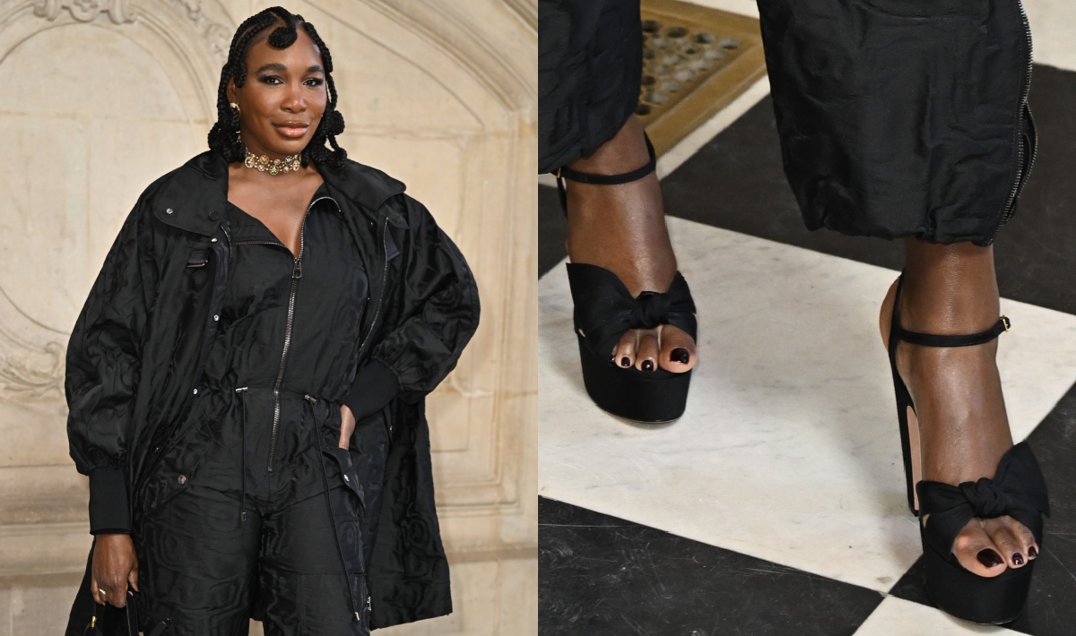 Venus Williams attends the Christian Dior Haute Couture Spring 2025 show in Paris on Jan. 27, venus williams wears a black jumpsuit and matching coat with black, bow-embellished platform sandals, venus williams wears black high heel bow-embellished platform sandals