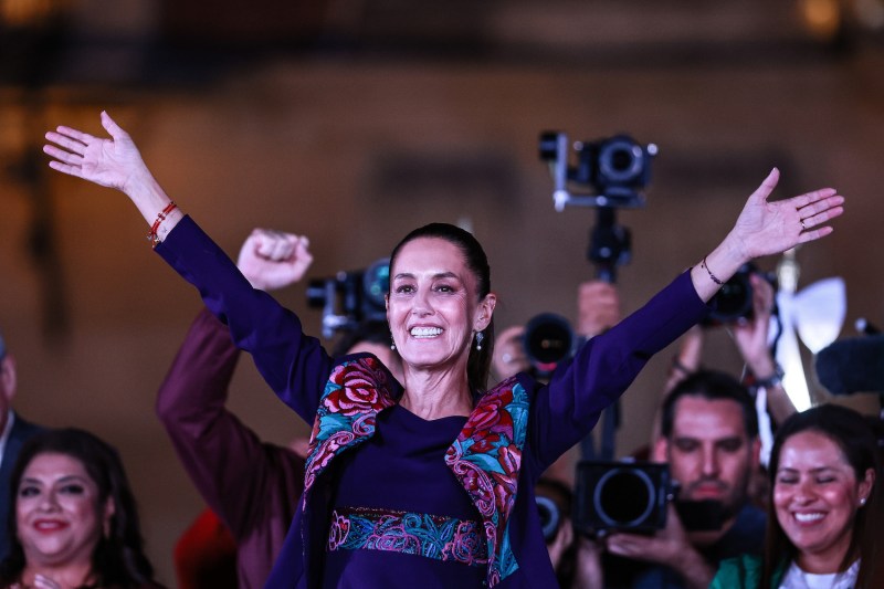 Mexican President-elect Claudia Sheinbaum waves during her victory speech at Zócalo Square in Mexico City on June 3.