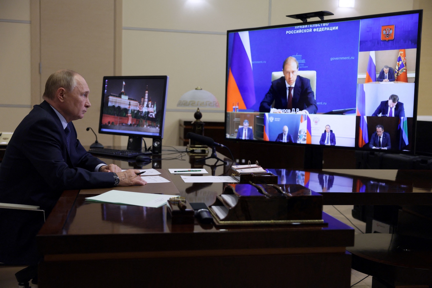 Russian President Vladimir Putin chairs a video meeting on the situation in the country’s Belgorod, Kursk, and Bryansk regions following Ukraine’s incursion into Russia, at the Novo-Ogaryovo residence outside Moscow on Aug. 22.