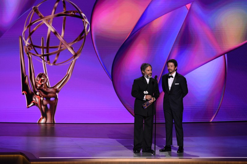 Mexican actors Gael García Bernal and Diego Luna speak onstage during the 76th Emmy Awards at the Peacock Theatre in Los Angeles on Sept. 15.