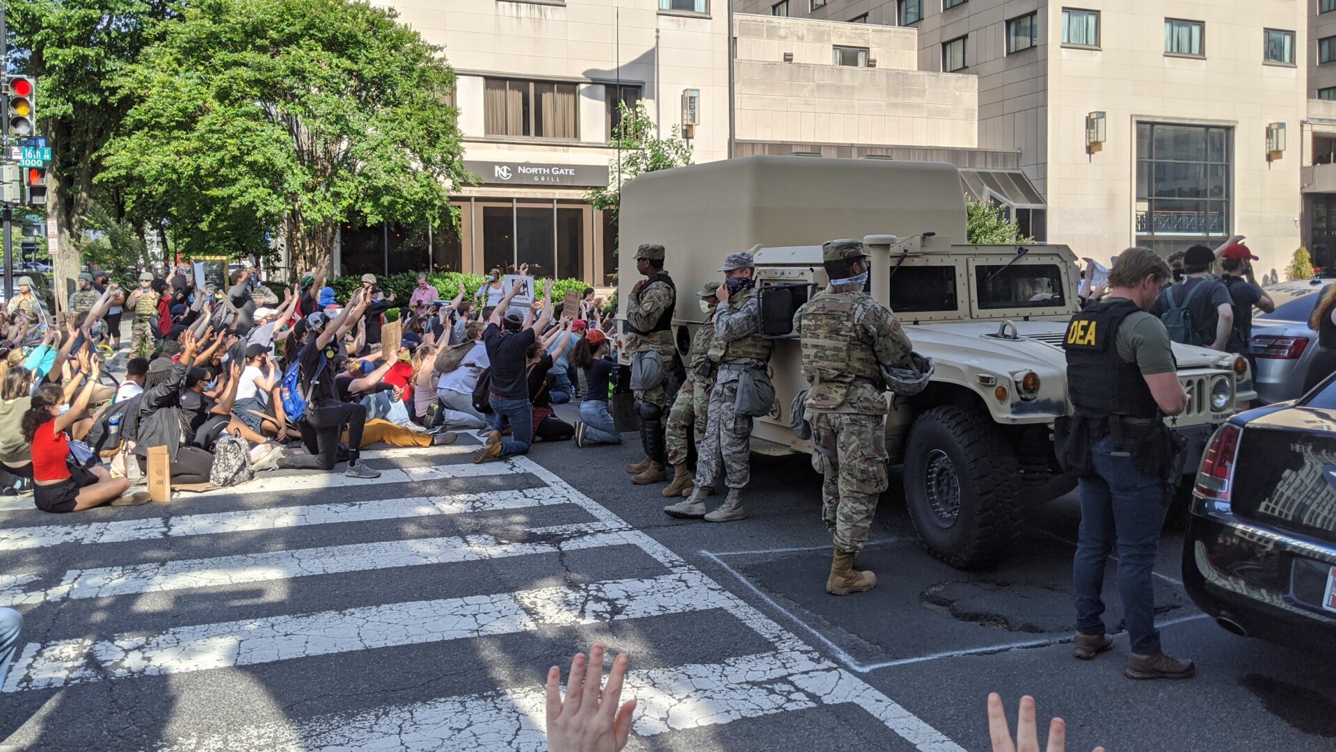 Troops on the road as protesters kneel in D.C. on June 2.