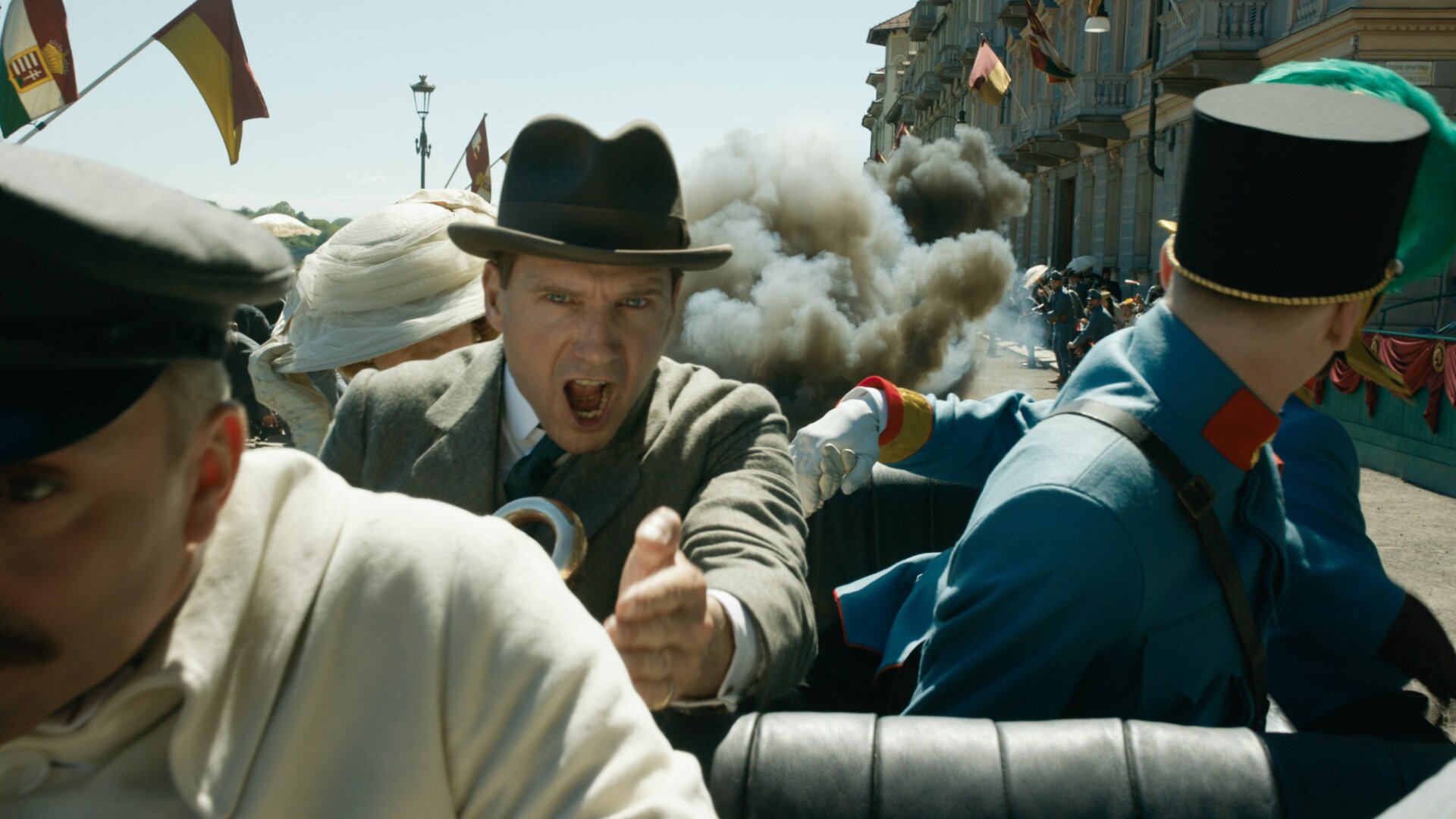 Ralph Fiennes escaping an explosion.