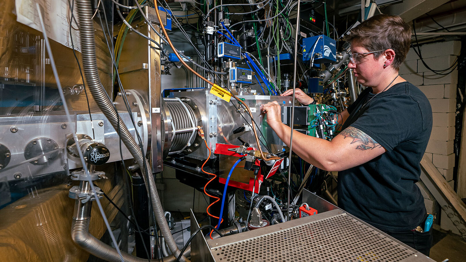 A scientist working on a separator in the experiment.