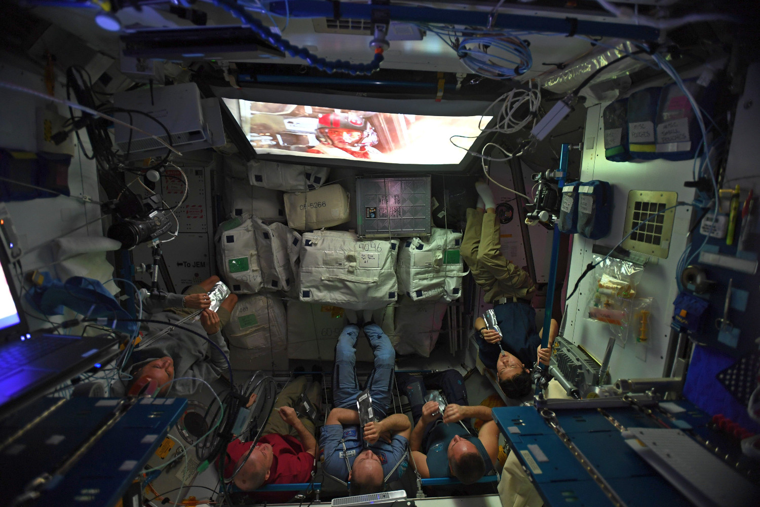 Astronauts on board the International Space Station watch a Star Wars movie in 2017