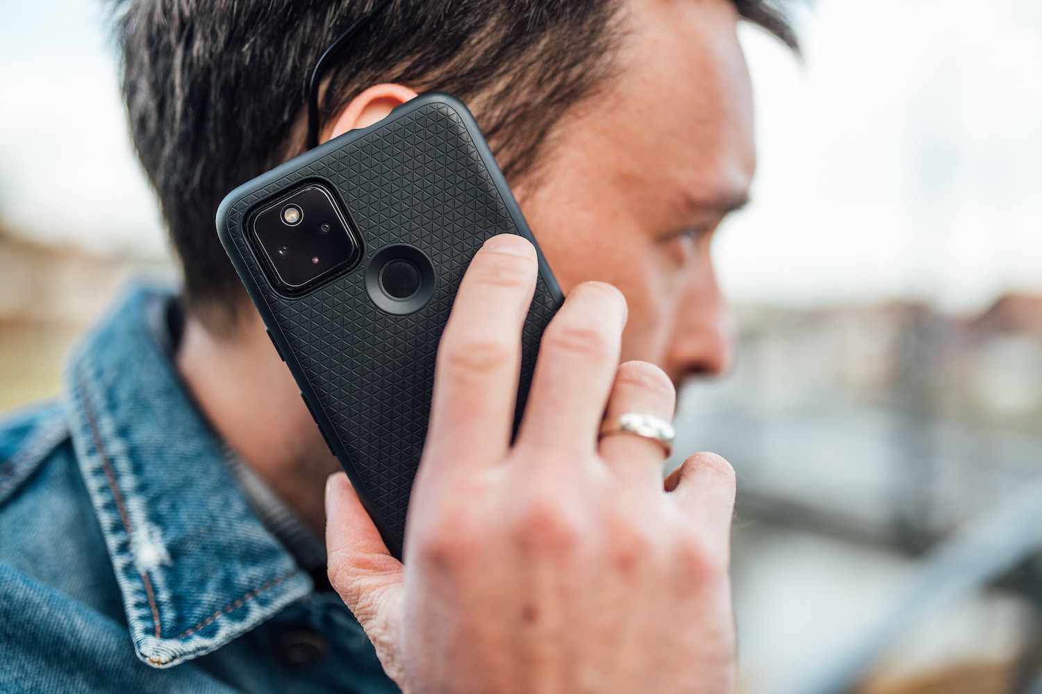 Image of a man talking on a smartphone