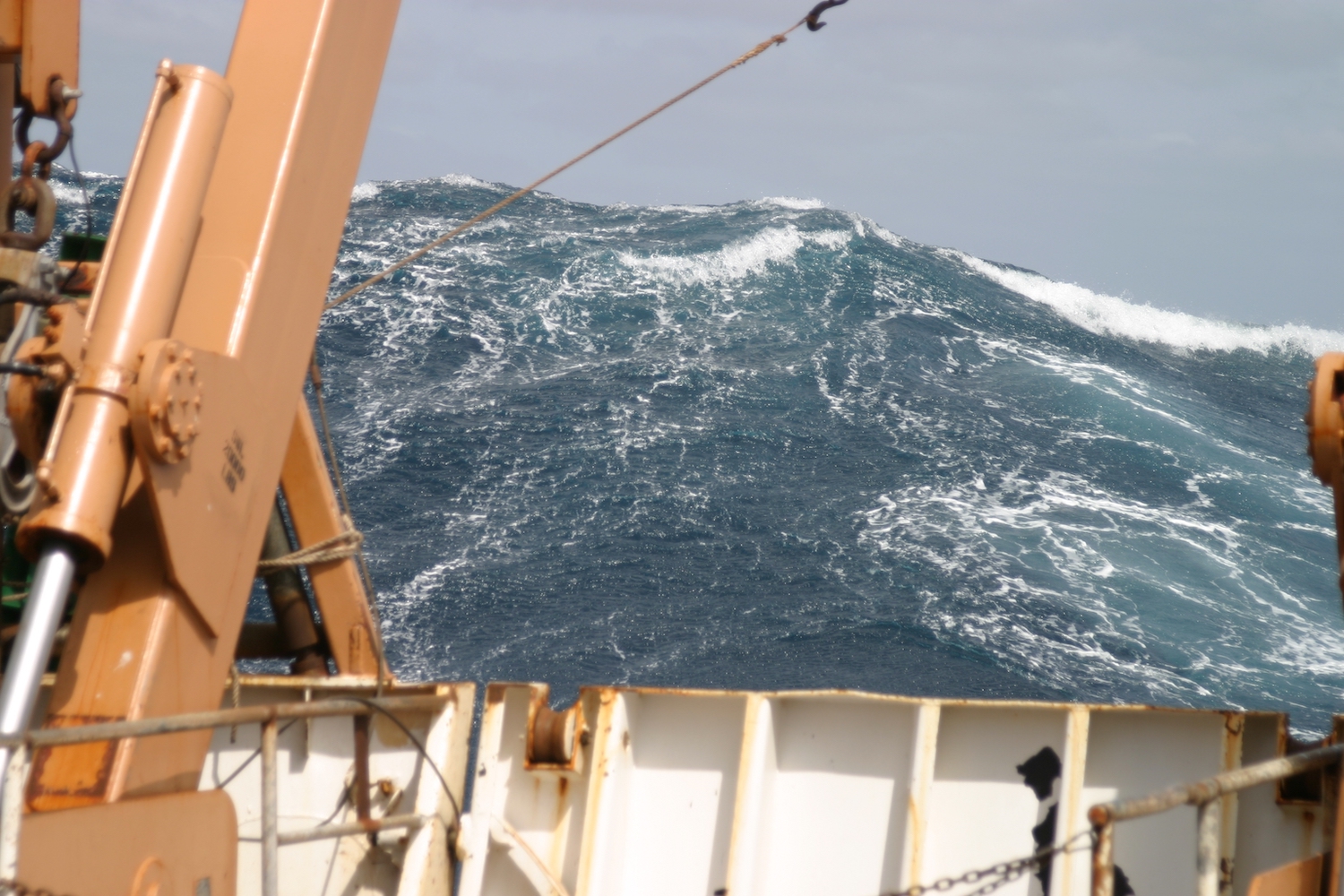 Image of a large wave off bow of a ship