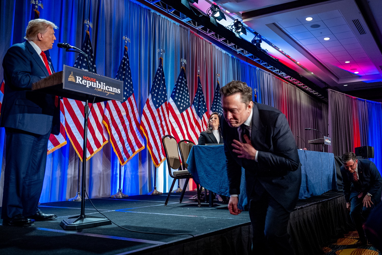 U.S. Speaker of the House Mike Johnson (R) escorts Elon Musk (2nd-R) as he arrives with U.S. President-elect Donald Trump (L) at a House Republicans Conference meeting at the Hyatt Regency on Capitol Hill on November 13, 2024 in Washington, DC. 