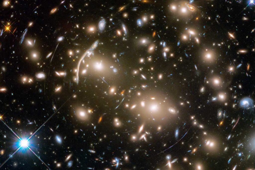 The galaxy cluster Abell 370, a gravitational lens 4 billion light-years away.