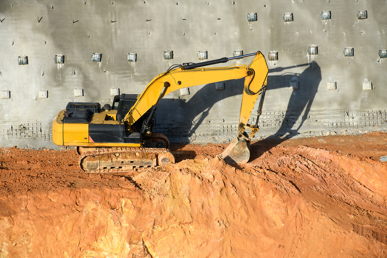 High Angle View Of Excavator At Construction Site