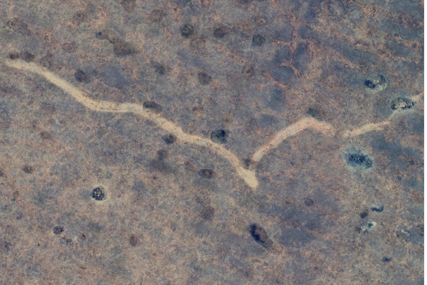 A distinctive mark cut into the Earth by twister.