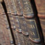 Encyclopedia Britannica books on a bookshelf.