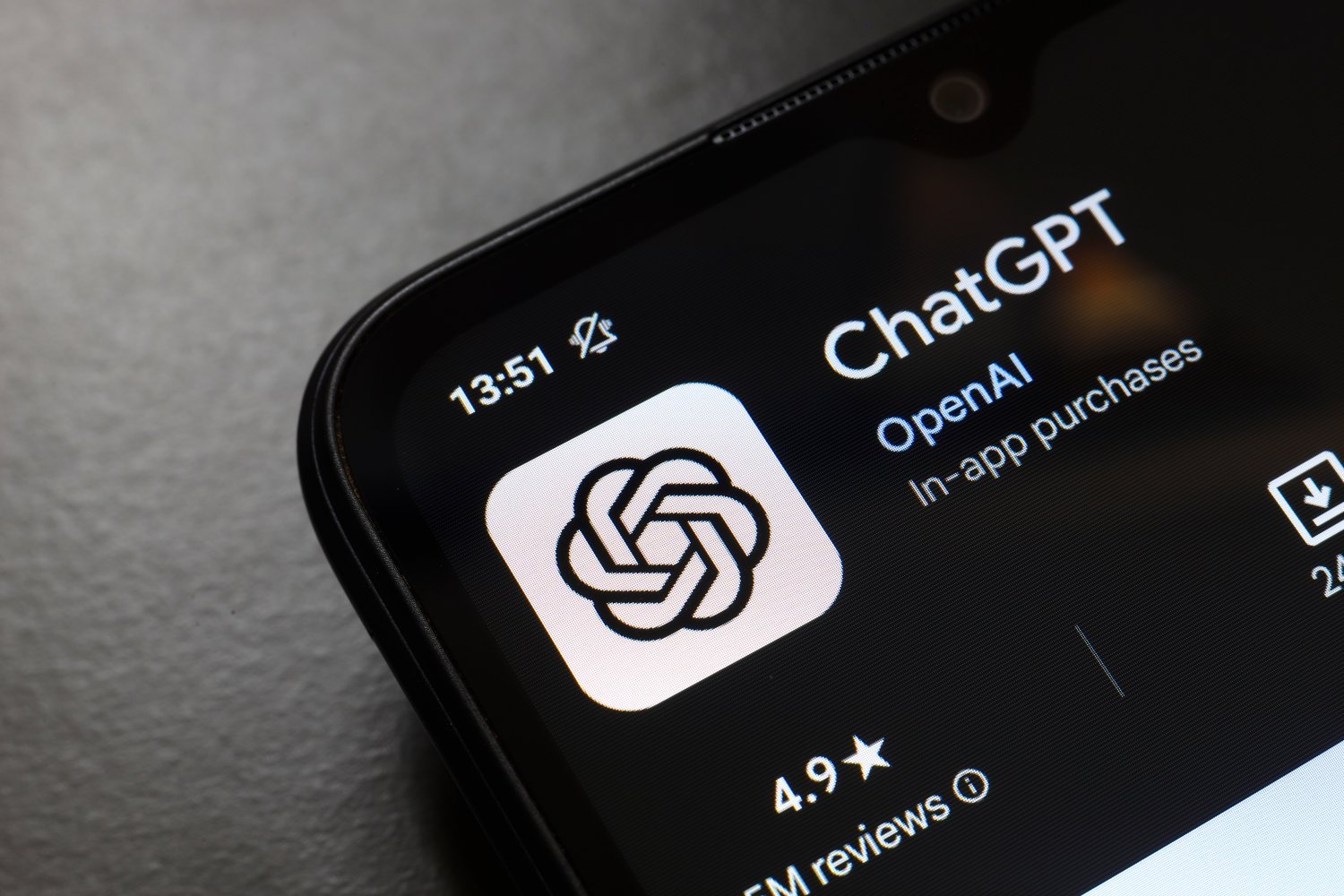 The ChatGPT app logo displays on the screen of a smartphone