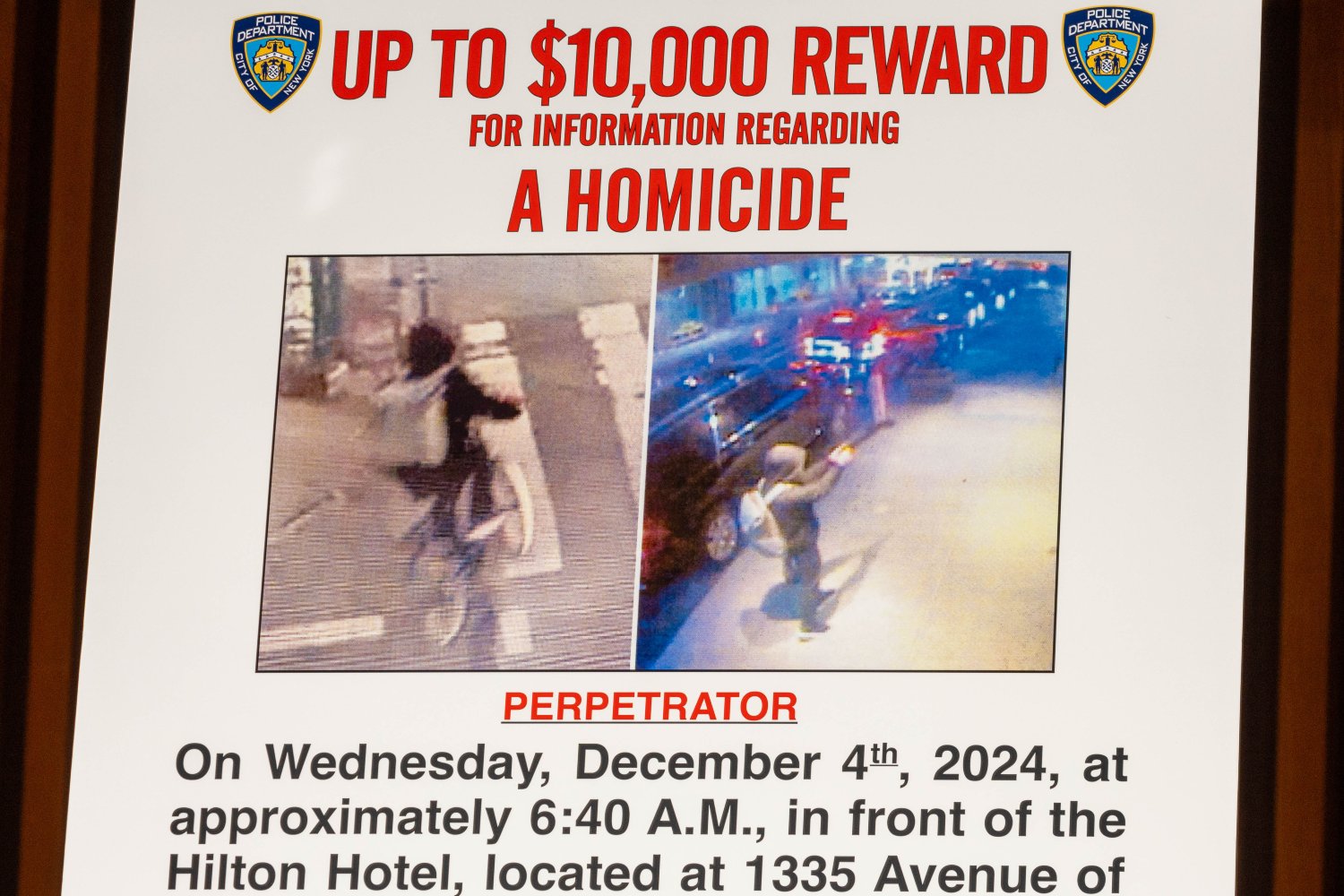 A wanted poster is set up for an NYPD press conference regarding the homicide of United Healthcare CEO Brian Thompson