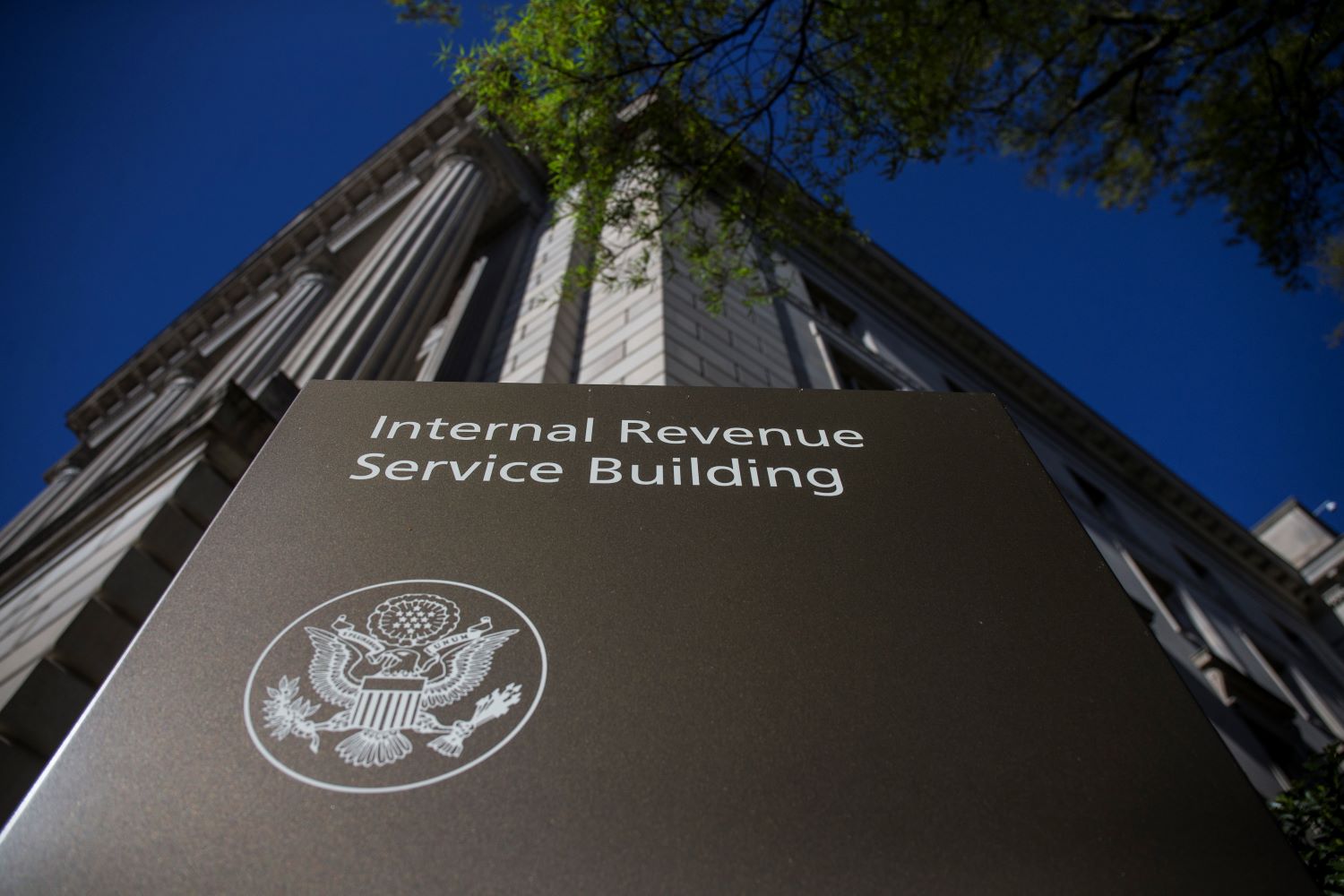 A shot of an IRS building looking up at it from a very low angle.