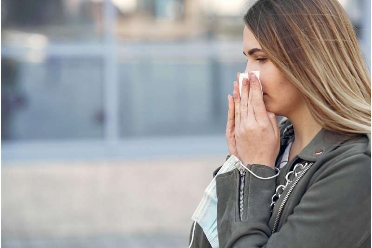 Woman Blowing Her Nose