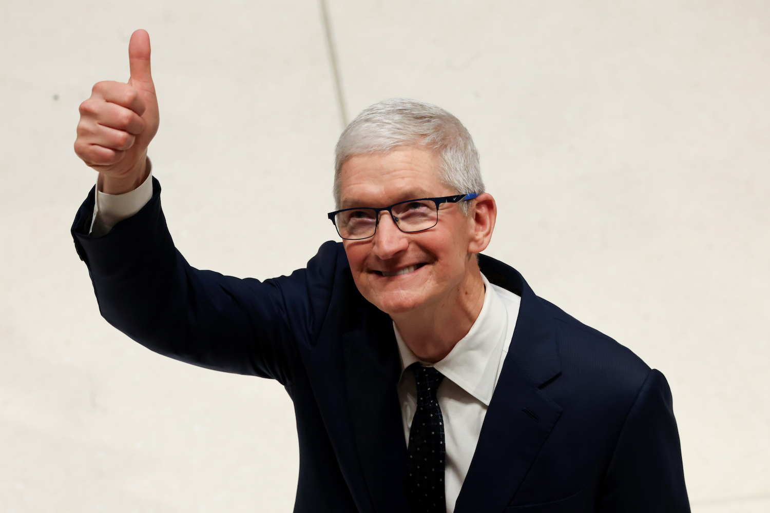 Apple CEO Tim Cook giving a thumb's up