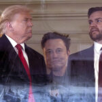 Elon Musk standing with Donald Trump and JD Vance