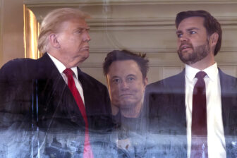 Elon Musk standing with Donald Trump and JD Vance