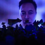 Elon Musk speaks virtually during the Alternative for Germany (AfD) general election campaign launch in Halle, Germany, on Saturday, Jan. 25, 2025.