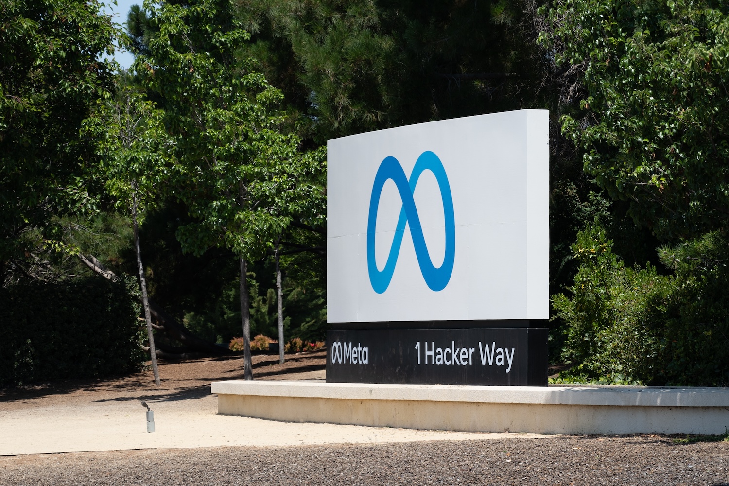 Meta logo on a sign in front of headquarters.