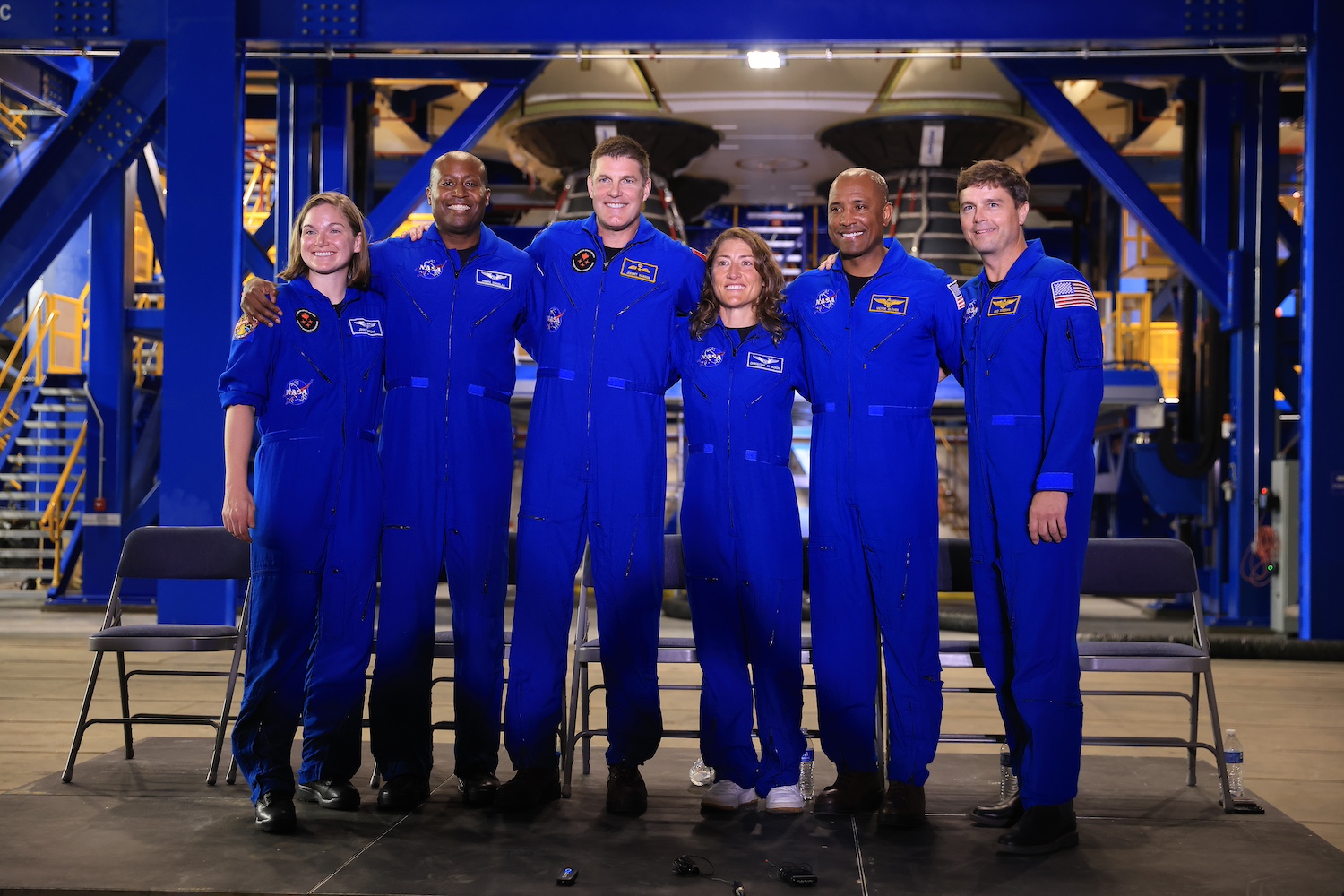 From left, CSA (Canadian Space Agency) astronaut Jenni Gibbons, NASA astronaut Andre Douglas, CSA astronaut Jeremy Hansen, and NASA astronauts Christina Koch, Victor Glover, and Reid Wiseman participate in a media day event on Monday, Dec. 16, 2024, inside the Vehicle Assembly Building at the agency’s Kennedy Space Center in Florida.