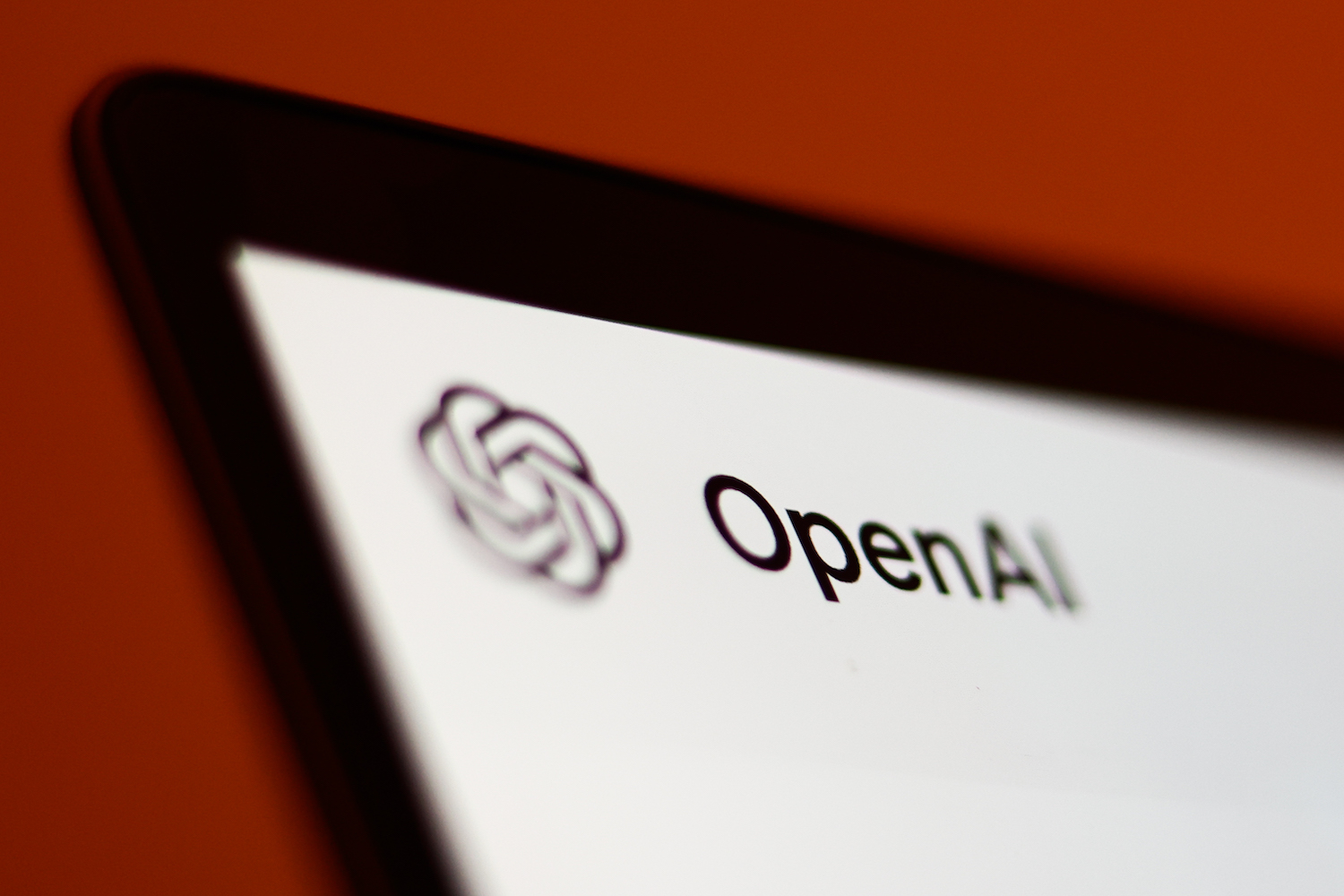 OpenAI logo on a laptop