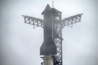 The SpaceX Starship rocket on the launch bad in foggy weather.