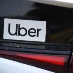 An Uber sticker is seen on a car at the start of a protest by ride share drivers on August 20, 2020 in Los Angeles, California.