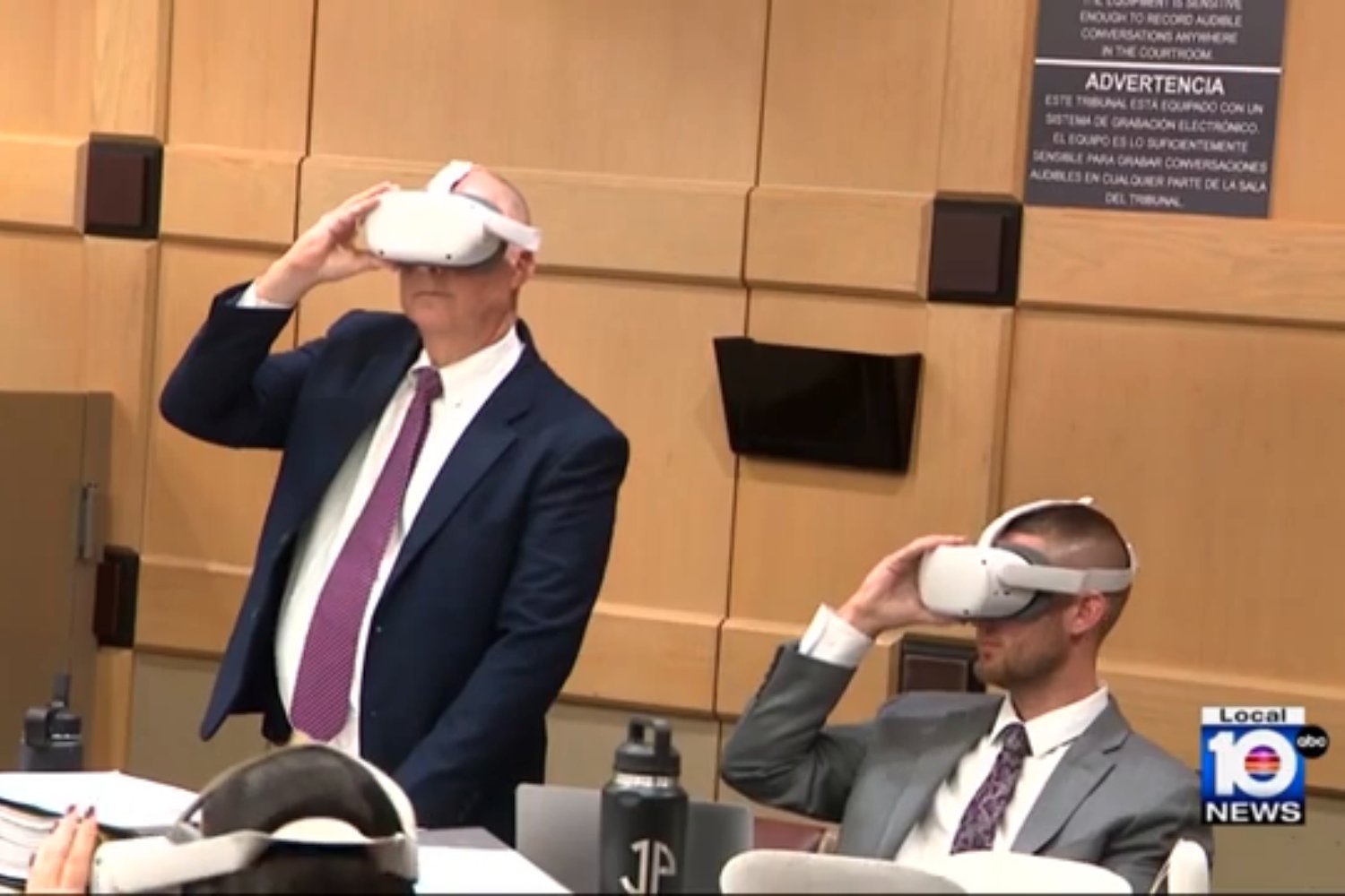 Attorneys in Florida watch a VR simulation of an altercation.