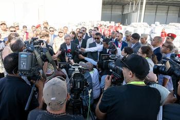 UN Secretary-General António Guterres (centre left) talks to the media at the Rafah crossing.