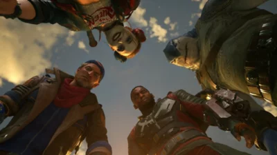 Suicide Squad: Kill the Justice League screenshot showing four characters huddled and looking downward.