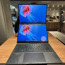 Asus Zenbook Duo on a table at a coffee shop