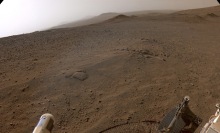 NASA Perseverance rover's view from the top of the Jezero Crater rim on Mars.