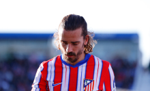 Antoine Griezmann of Atletico de Madrid looks on