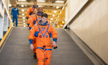 Artemis II crew walking down a ramp