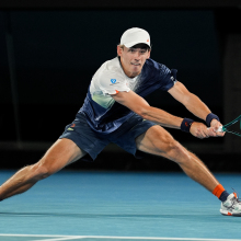 Alex de Minaur of Australia plays a backhand