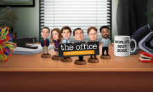 The Office cast as bobble heads on desk 