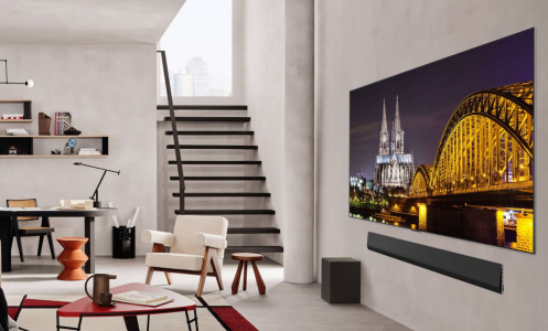 Living room scene with LG OLED TV hanging on wall