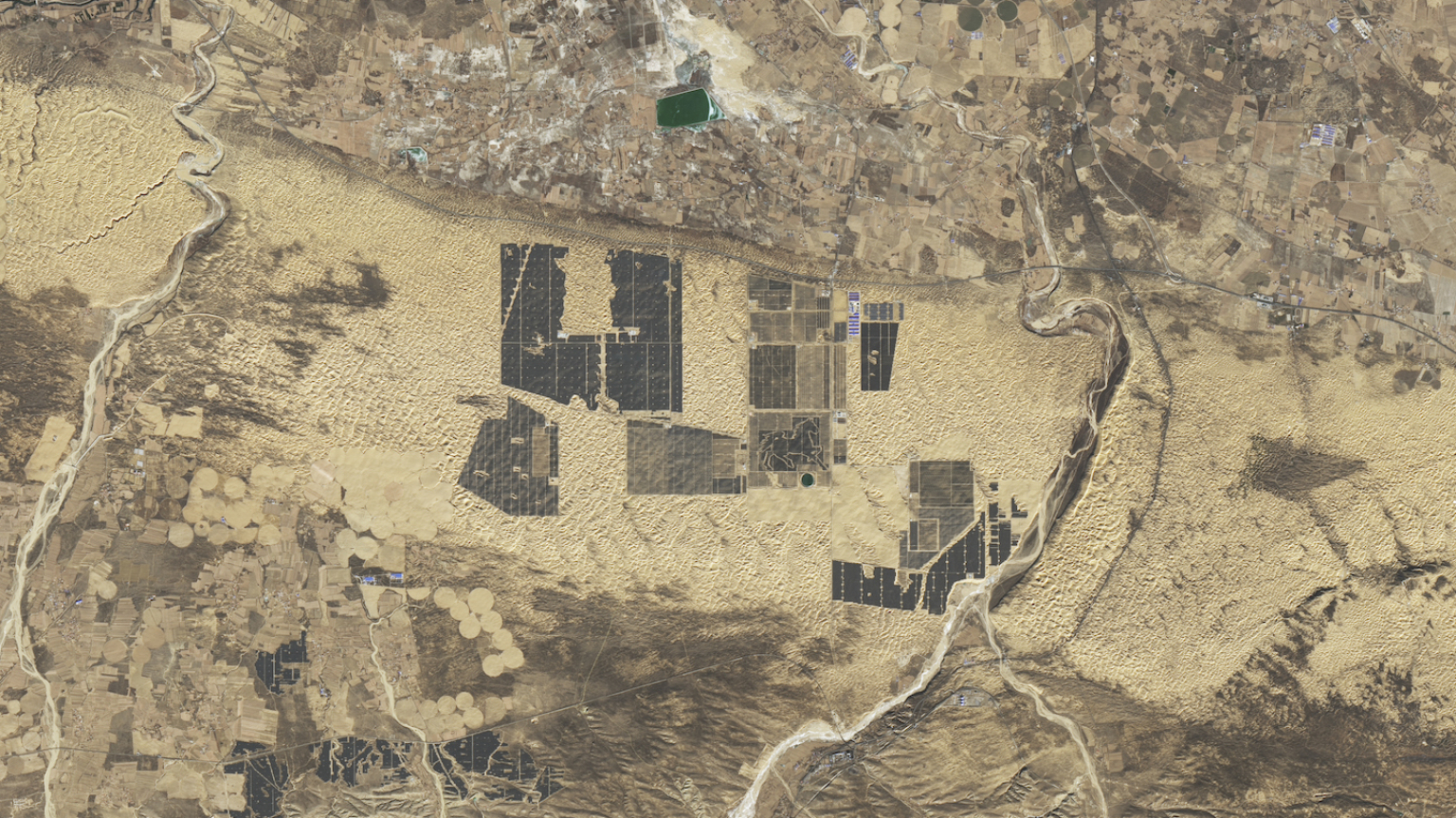 A sprawling expanse of solar panels in China's Kubuqi Desert as viewed by a U.S. Geological Survey Landsat satellite. 